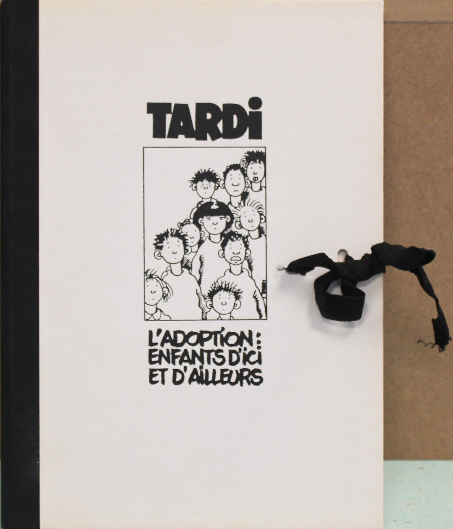 Tardi: Portfolio „L'adoption: Enfants d'ici et d'ailleurs“